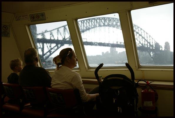 the Harbour Bridge from a ferry on a rainy day